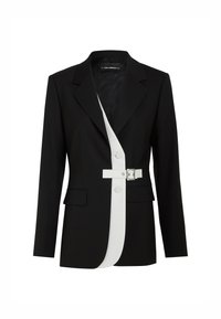 Melna žakete ar kontrastējošu balto priekšējo paneli, strukturētu siluetu, ar iedobēm pie kakla, sānu kabatām un baltu sprādzes jostu.