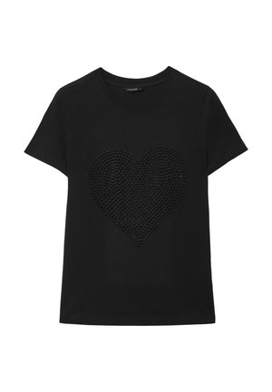 T-shirt noir à manches courtes avec un col rond et un motif de cœur noir texturé sur le devant.