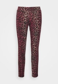 Slim-fit leggings with maroon and beige leopard print and three maroon stripes along the outer sides of each leg.