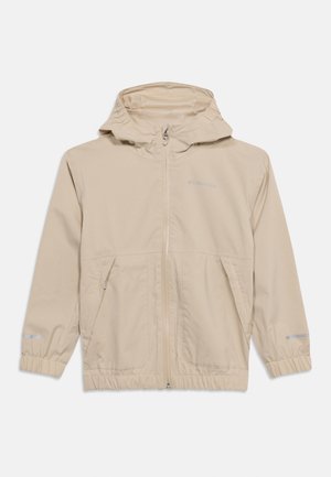 Veste à capuche beige clair avec fermeture éclair frontale, deux poches inclinées à fermeture éclair, poignets élastiques et fines bandes réfléchissantes sur les manches.