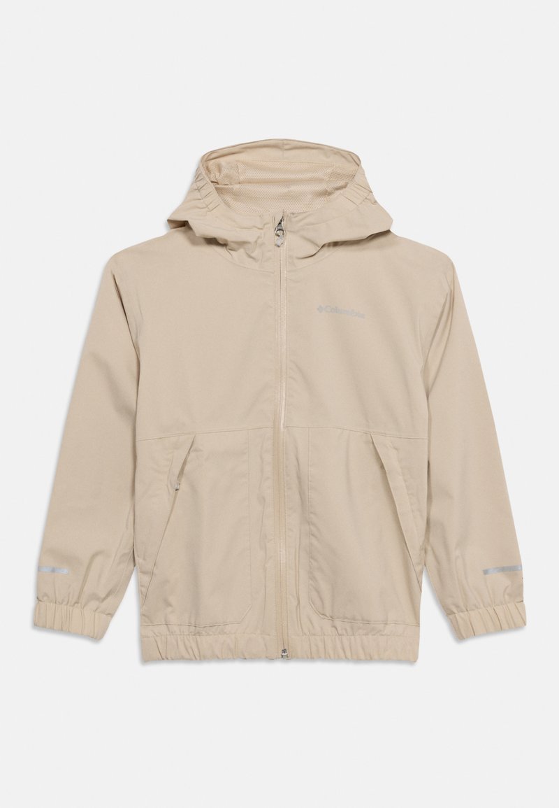 Veste à capuche beige clair avec fermeture éclair frontale, deux poches inclinées à fermeture éclair, poignets élastiques et fines bandes réfléchissantes sur les manches.