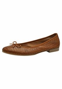 Brown flat shoe with perforated leather design, rounded toe, small bow accent on the front, and low stacked heel.