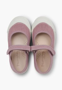 Pink canvas Mary Jane shoes with a white rubber toe cap and strap. Interior features perforations for breathability.
