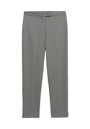 Pantalons à carreaux noir et blanc avec un design ajusté, texture lisse et coupe droite. Dotés d'une taille et sans poches visibles.