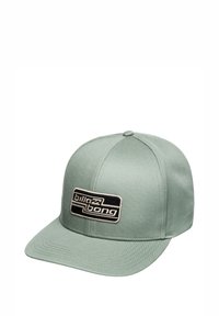 Cappello di tessuto verde chiaro, con un patch rettangolare nero che presenta il logo "Billabong". Forma strutturata con visiera piatta.