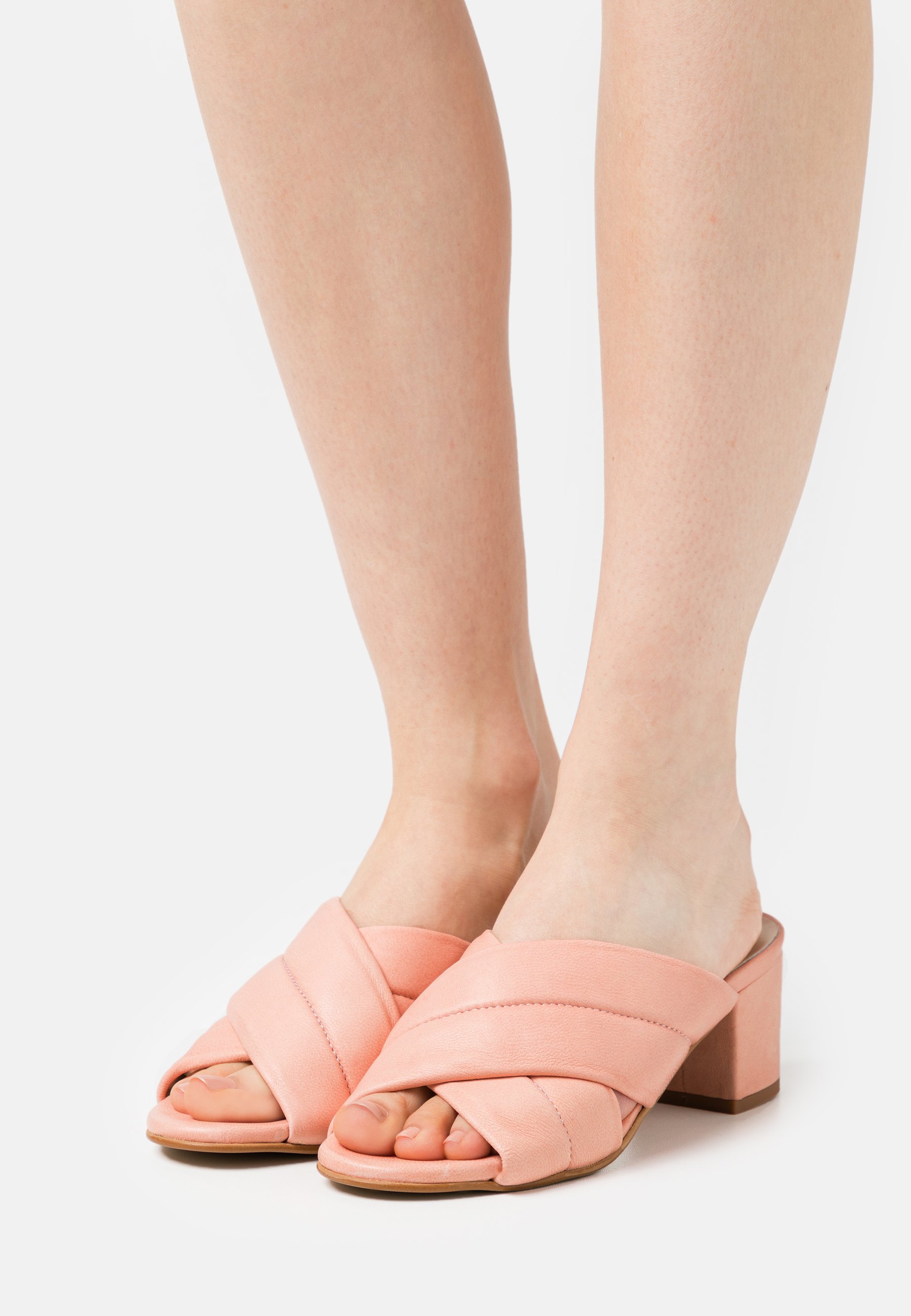 blush heeled mules