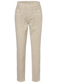 Béžové kalhoty rovného střihu, vyrobené z bavlny, s předními kapsami a diagonálními akcenty a zapínáním na knoflík v pase.