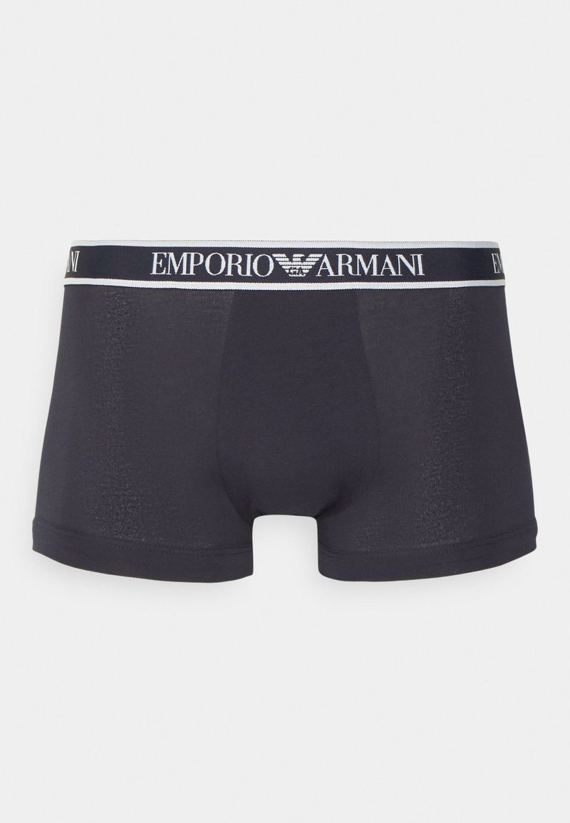 Boxers en bleu marine avec un design ajusté, une taille élastique arborant le logo "Emporio Armani" et une texture lisse.