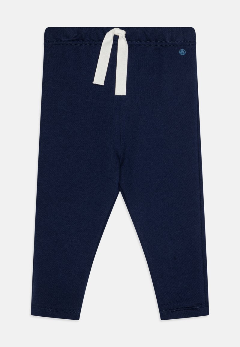 Navy blå leggings laget av myk stoff, med elastisk midjebånd og hvit snor. Ingen synlige mønstre eller detaljer.