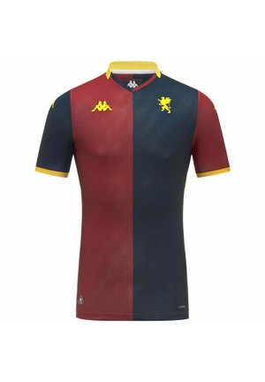 Maillot de football divisé verticalement avec le côté gauche rouge foncé et le côté droit bleu marine, bordure jaune, et logos de lion et de marque sur la poitrine.