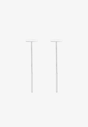 Silver earrings with a cylindrical post and flat circular top. Smooth texture with a minimalistic design, showcasing a sleek and modern look.