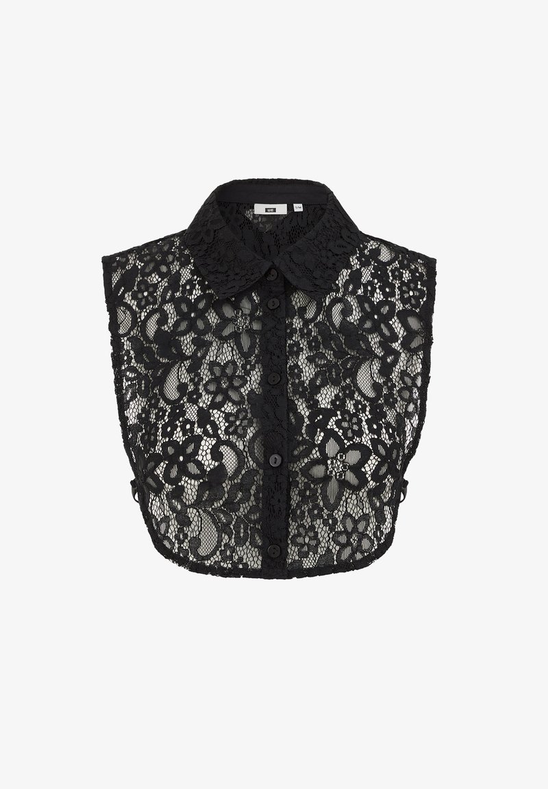 Svart spetskort topp med krage, knappstängning och blommönster. Genomskinligt tyg med vågigt nederkant.