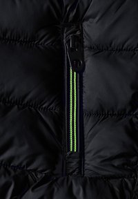 MINOTI PADDER PUFFER - Winter jacket - black neon green