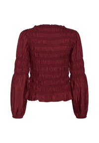 Blouse rouge foncé à manches longues en tissu smock extensible, manches bouffantes et ourlet volanté en bas au dos.