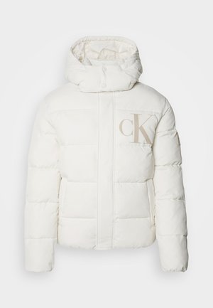 White puffer jacket with a high collar and hood. Features quilted sections and a large beige "CK" logo on the front. Smooth texture.