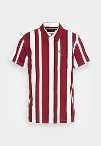 Kurzärmliges Hemd mit roten, weißen und schwarzen vertikalen Streifen. Verfügt über eine Brusttasche und einen kontrastierenden Kragen. Aus Baumwollstoff.