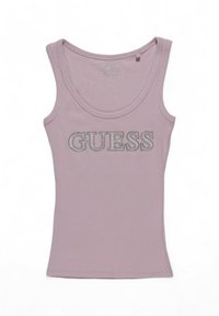 Top in lilac con scollatura a barca. Presenta la scritta "GUESS" in strass argentati. Realizzato in tessuto elasticizzato; design aderente.
