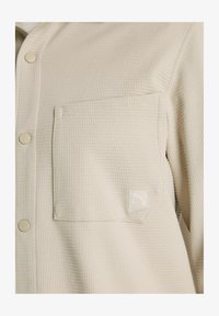 Unausgewählt, beige