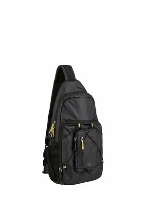 Zaino a tracolla nero con multiple tasche con cerniera, cursori delle cerniere gialli e tracolla imbottita regolabile, mostrato su sfondo bianco.