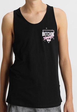 Débardeur noir sans manches en coton, avec un design graphique coloré à l'avant, incluant des étoiles et des formes géométriques.