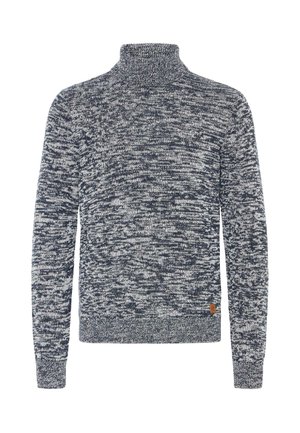 Meleret striktrøje med turtleneck i sort og hvid med lange ærmer og et lille brunt logo-patch nær kanten.