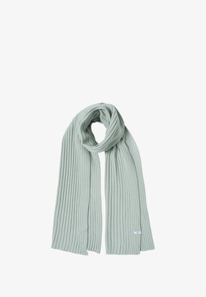 Lichtgroene geribbelde sjaal van zachte stof, met een gestructureerd patroon en een klein label aan het uiteinde.