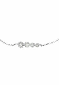 Silver kedjearmband med fyra runda klara ädelstenar i avtagande storlek, inställda i klor.