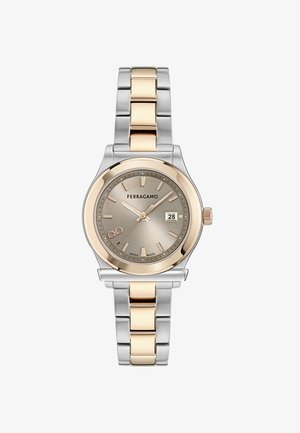 Két tónusú ezüst és arany Ferragamo karóra bézs számlappal, arany mutatókkal, 3 óránál dátumablakkal és fémkapcsolatos szíjjal.