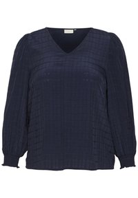 Blusa azul marino de tela arrugada, con un escote en V, mangas largas abullonadas y puños con gather. Diseño sencillo y texturizado en toda la prenda.