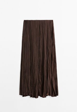 Brown pleated skirt made of lightweight fabric. Features a gathered waistband and floor-length design with a smooth texture.