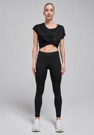 PERFECT RMXROMY - Leggings - Trousers - black