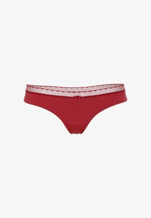 Mutandine da donna stile bikini rosse con un elastico trasparente a righe e un piccolo fiocco al centro davanti.