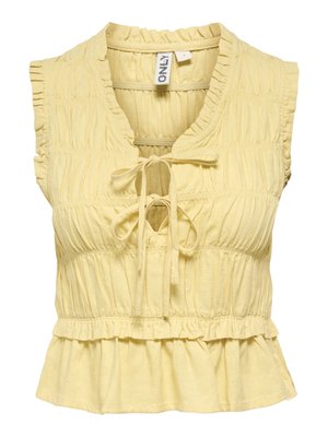 Bezrukávová svetložltá blúzka s volánmi na okrajoch, detailom zozbieraného materiálu, výstrihom do V so zdvojenými viazanými mašľami a lemom s peplum.