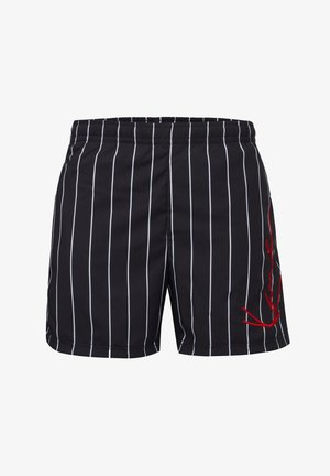 Black swim shorts featuring vertical white stripes, an elastic waistband, and a red embroidered detail on the side.