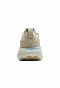 Bež jooksusisetele, millel on tekstuuriga kudum, helesinine aktsent kanna piirkonnas ja pehme valge vaheplaat. Omab tugevdatud tagumise tabmikut.