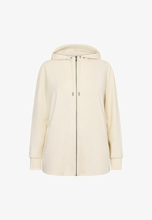 Crèmekleurige hoodie met een rits aan de voorkant, koordjes en lange mouwen. Gemaakt van zachte stof met een relaxte pasvorm en subtiele textuur.