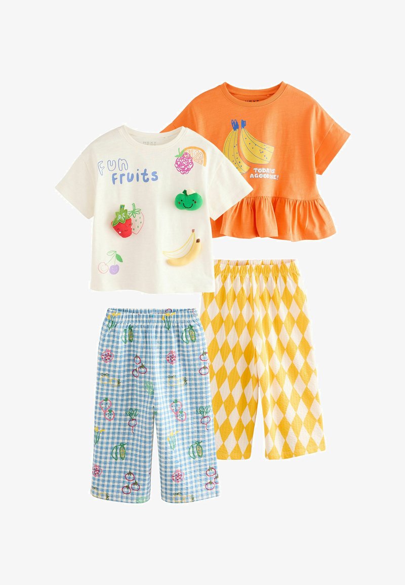 Two children's outfits with fruit-themed tops—white "Fun Fruits" shirt, orange banana shirt with ruffle—and patterned blue and yellow shorts.