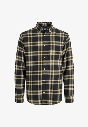 Melna svītrainā krekliņā ar dzelteniem un baltajiem akcentiem, pogu apkakle, garas piedurknes un priekšā esošais pogu slēgums. Kokvilnas materiāls, vidēja tekstūra.