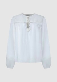 Blusa bianca a maniche lunghe con colletto in pizzo, tessuto arricciato sotto, scollatura rotonda e fiocco frontale con pon pon.