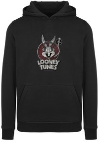 Fekete kapucnis pulóver, elülső zsebbel, amelyen Bugs Bunny grafikája látható célkereszttel és alatta a "Looney Tunes" felirat.