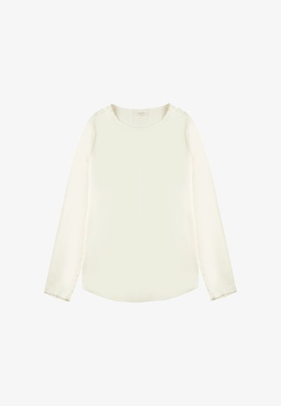 Langärmlige Bluse in Off-White mit rundem Ausschnitt, glatter Textur und leicht abgerundetem Saum. Klarer Design, ohne Muster oder Akzente.