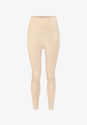 Beige leggings made from stretchy fabric. High waistband with a smooth texture. Slim, fitted design tapering at the ankles.