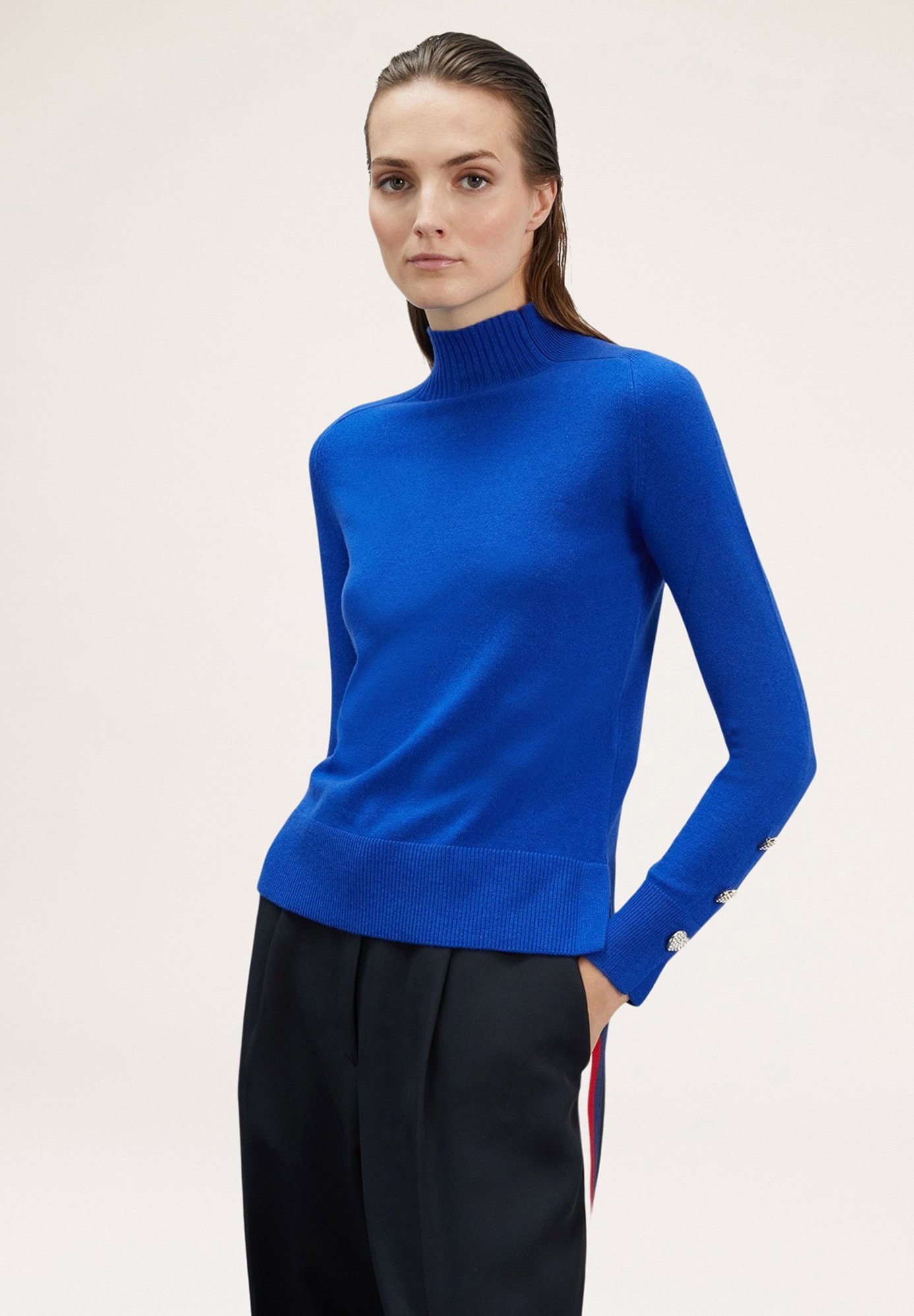 Motivi Maglione Con Borchie Motivi CON BOTTONI GIOIELLO SUL POLSI