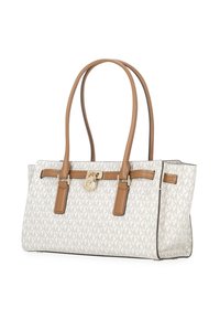 Borsa a spalla in tela beige stampata con manici e dettagli in pelle marrone. Presenta hardware dorato e un logo ben visibile sul davanti.
