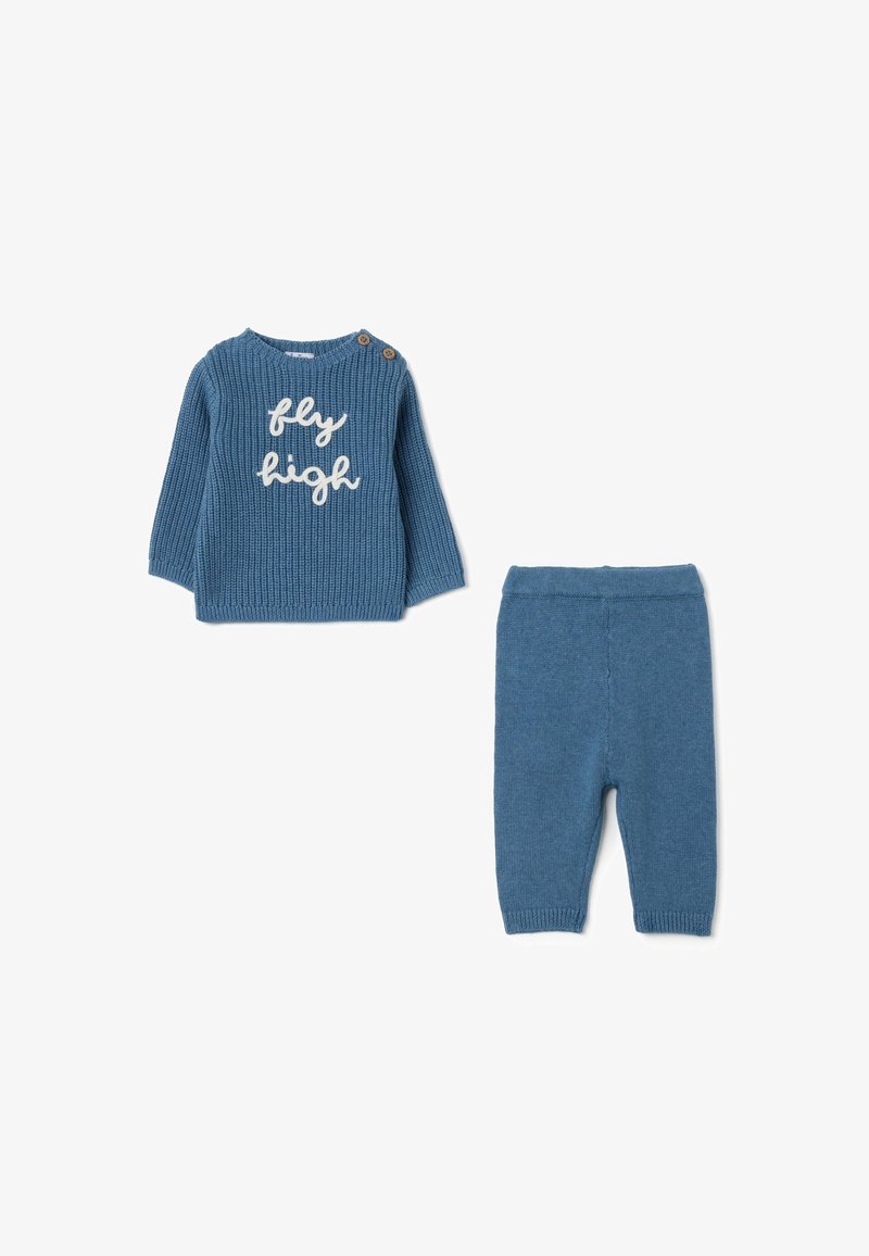 Two-piece children's outfit featuring a ribbed, blue knit sweater with "fly high" text and matching blue knit pants. Wooden button detail on sweater.
