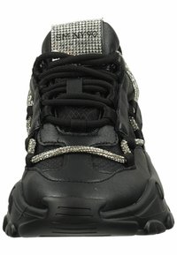 Black sneaker with a textured leather upper, adorned with silver rhinestone accents, featuring black laces and a cushioned sole.