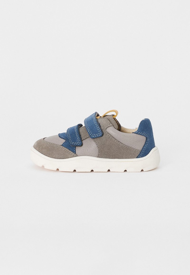 Gray and blue sneakers with suede and textile materials, double velcro straps, white rubber sole, and star-shaped design detail.
