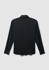 Maglietta nera a maniche lunghe con un design semplice, colletto e polsini con bottoni. Tessuto morbido con una vestibilità slim e dettaglio dello yoke sul retro.