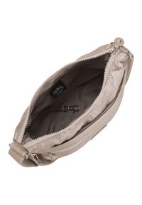 Beige crossbody bag with a textured exterior, zip closure, and a hooked inner clip. Interior lining is smooth and light brown, featuring a brand label.