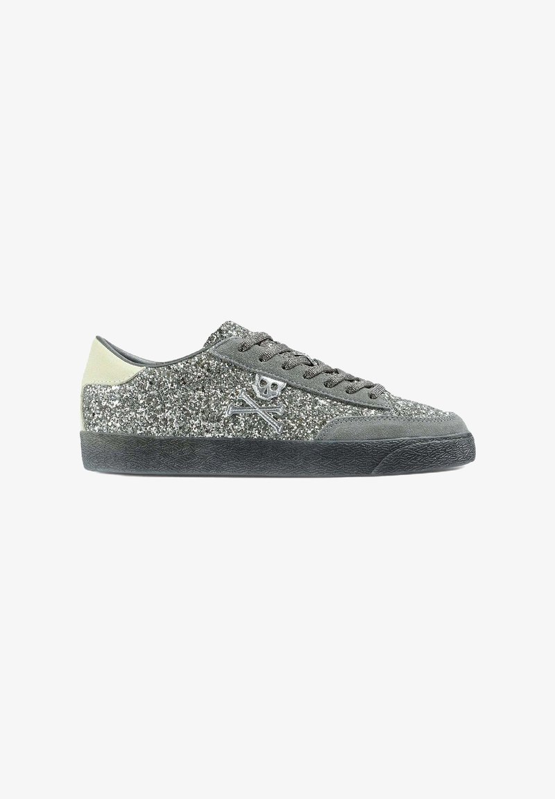 Glittery grey sneakers with a suede upper, black rubber sole, and silver skull crossbones detail on the side. Lace-up design.